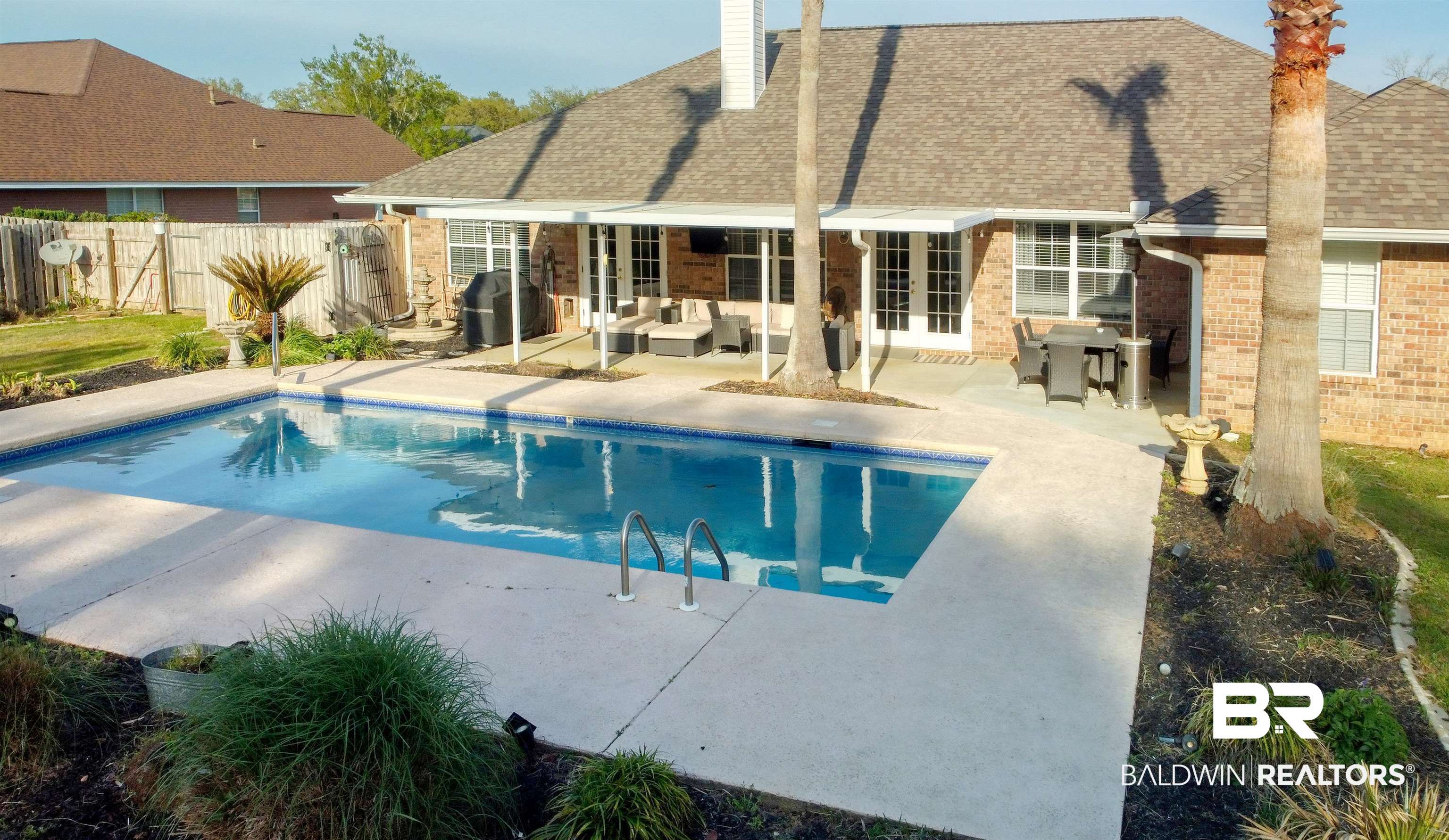 12893 Hunters Chase Foley, AL 36535 - Photo 14 of 42 View of pool with an outdoor living space, a patio area, french doors, a fenced in pool, and fence