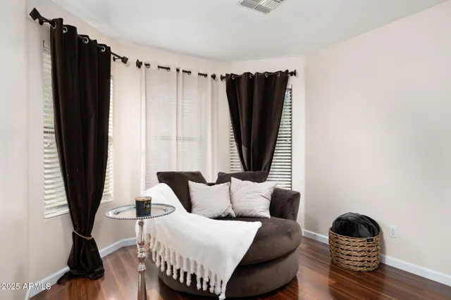 a bedroom with a bed and a table in it