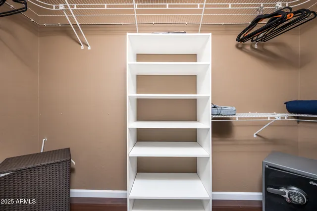 a view of a house with swimming pool and sitting area