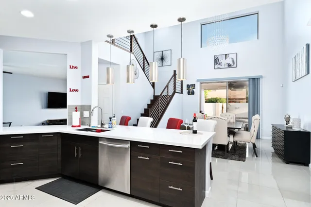 a living room with furniture and a table