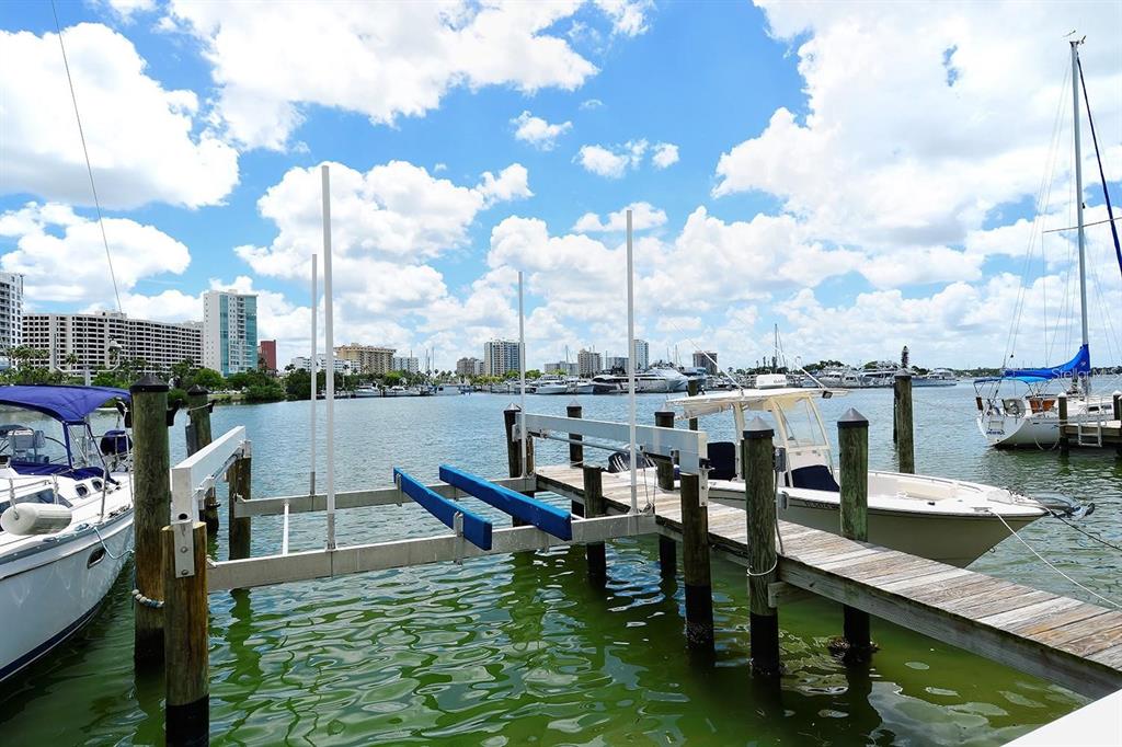 650 Golden Gate Point, Unit 602 Sarasota, FL 34236 - Photo 3 of 50 a view of a lake with a sitting area