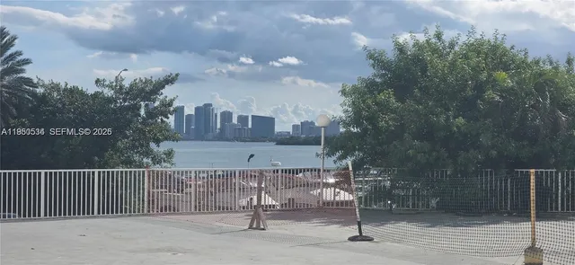 a view of a house with a bench
