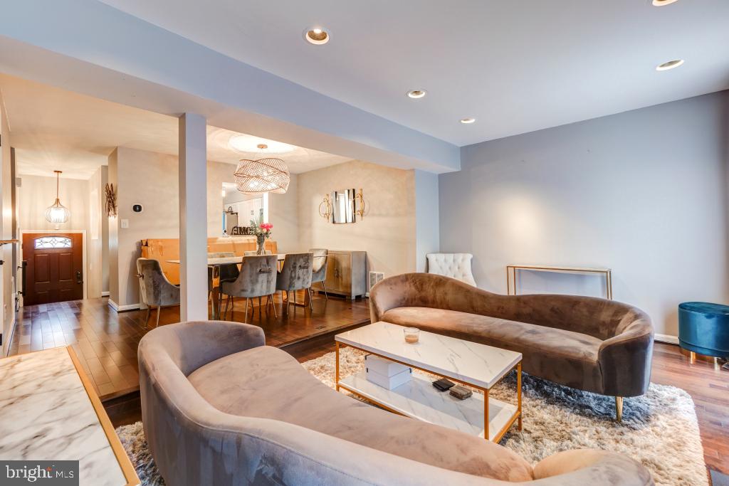 51 Kinsman View Circle Silver Spring, MD 20901 - Photo 11 of 32 a living room with furniture and wooden floor
