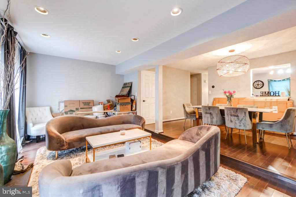 51 Kinsman View Circle Silver Spring, MD 20901 - Photo 13 of 32 a living room with furniture and a table