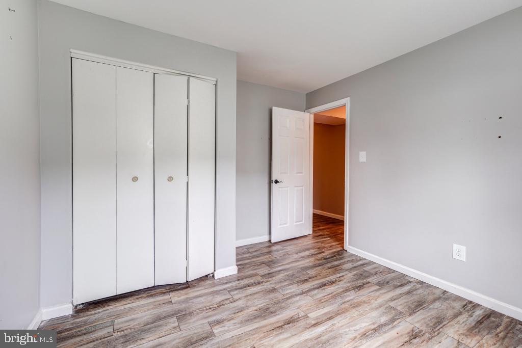 51 Kinsman View Circle Silver Spring, MD 20901 - Photo 16 of 32 a view of an empty room with wooden floor