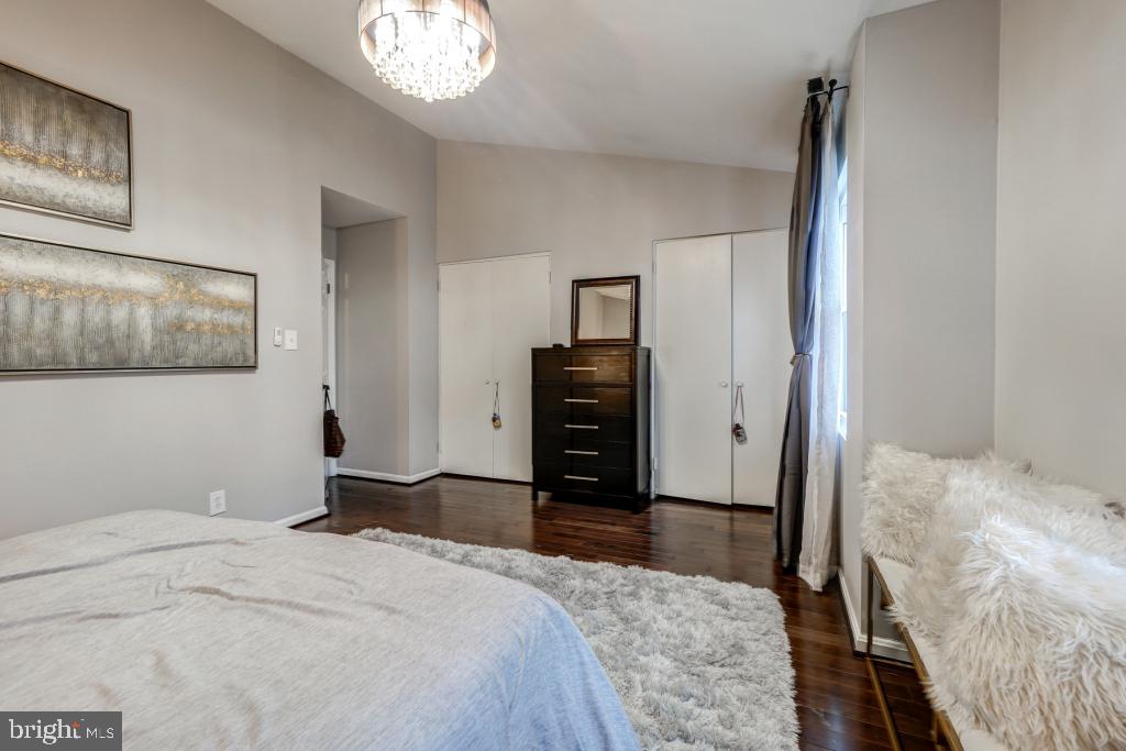 51 Kinsman View Circle Silver Spring, MD 20901 - Photo 27 of 32 a bedroom with a bed and a television