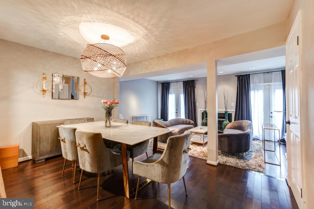 51 Kinsman View Circle Silver Spring, MD 20901 - Photo 9 of 32 a view of a dining room with furniture and wooden floor
