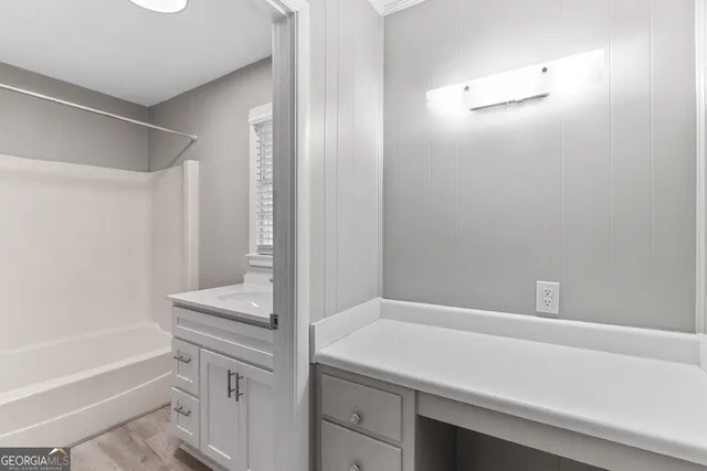 a bathroom with a bathtub