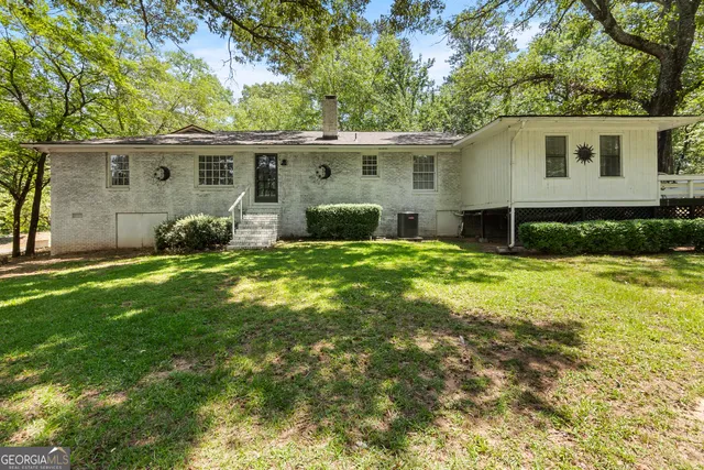 front view of a house and a yard