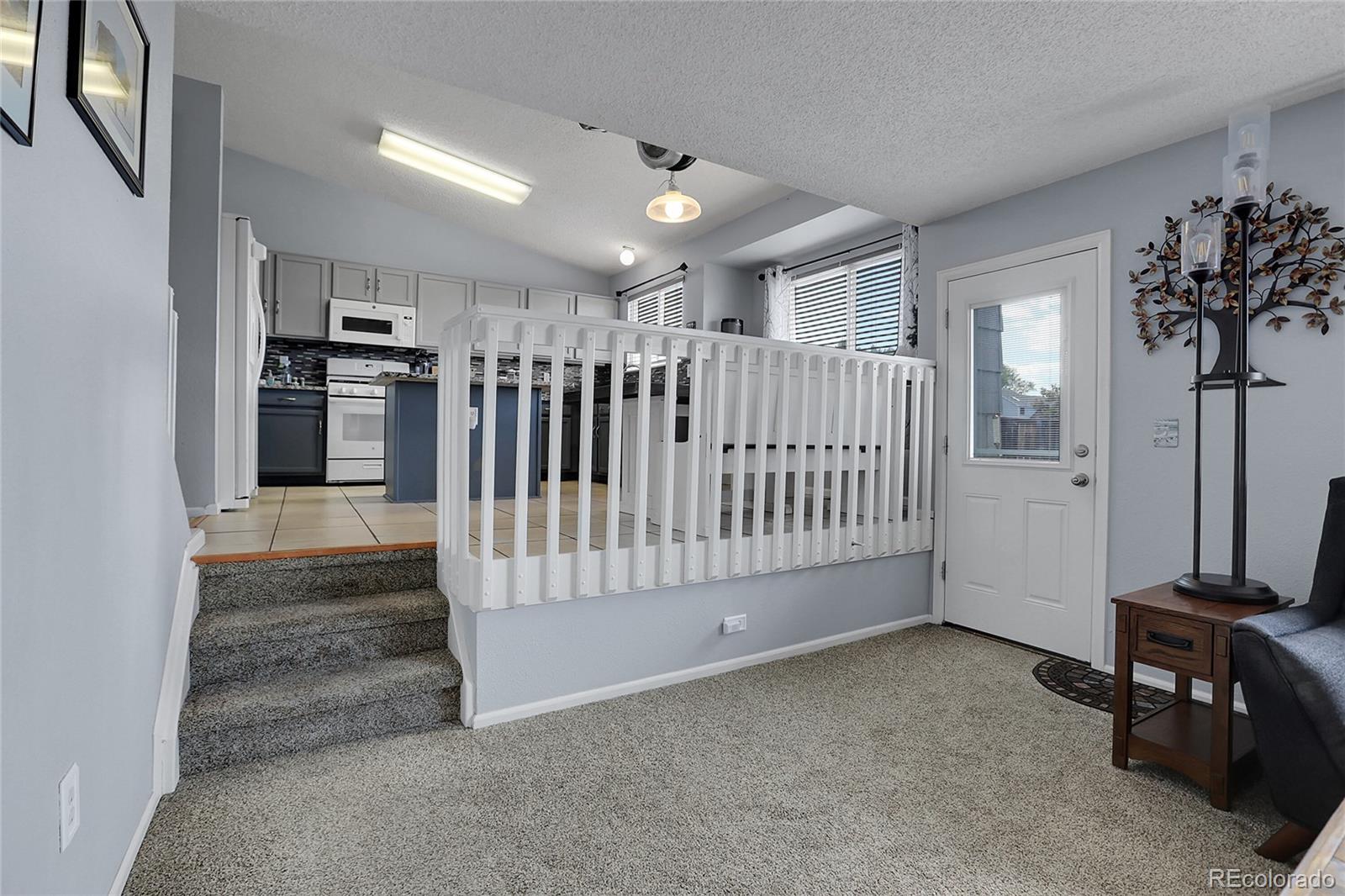 9806 South Castle Ridge Circle Highlands Ranch, CO 80129 - Photo 14 of 36 a view of entryway and hall