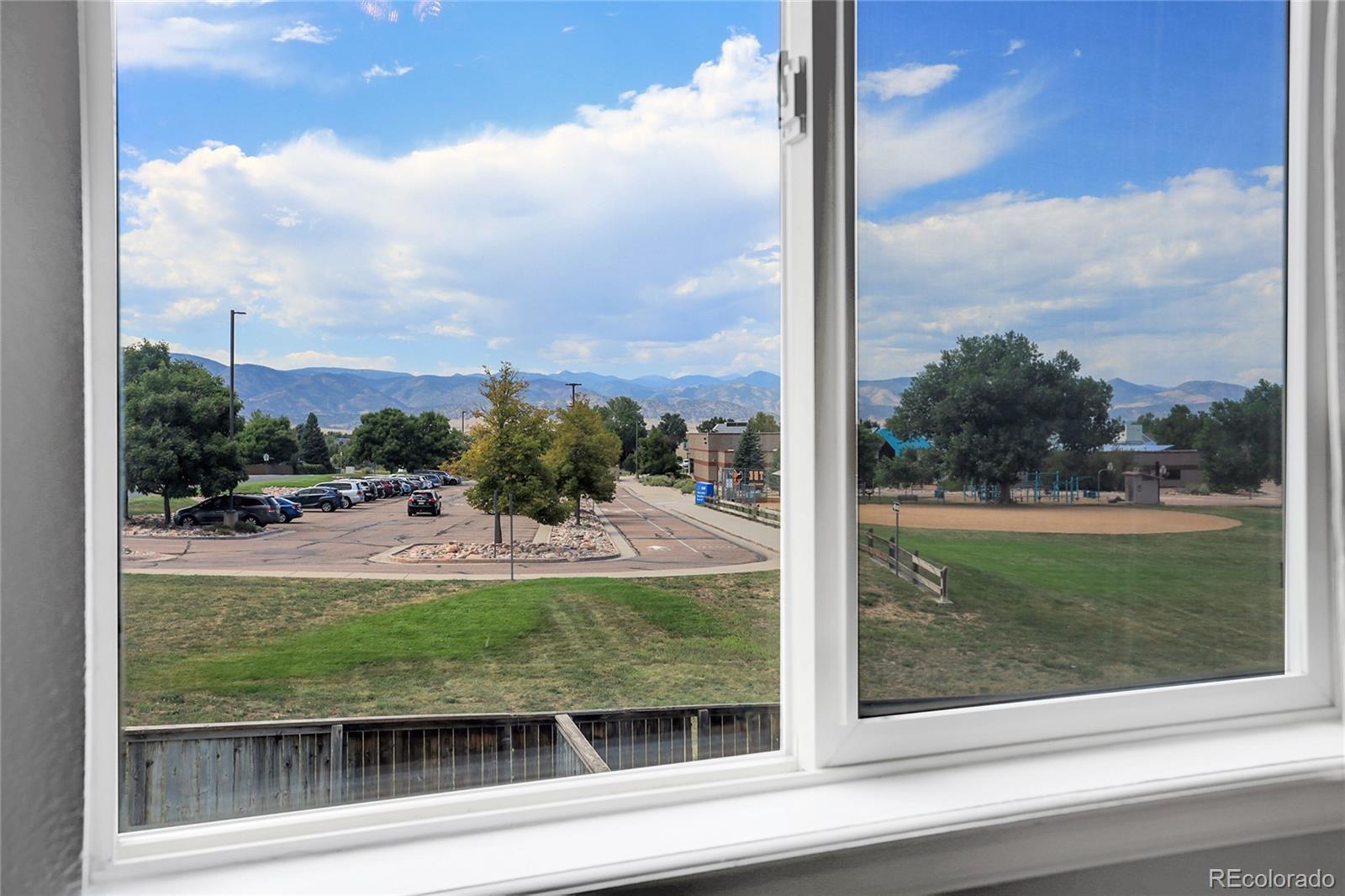 9806 South Castle Ridge Circle Highlands Ranch, CO 80129 - Photo 20 of 36 a view of a sink and yard from a window