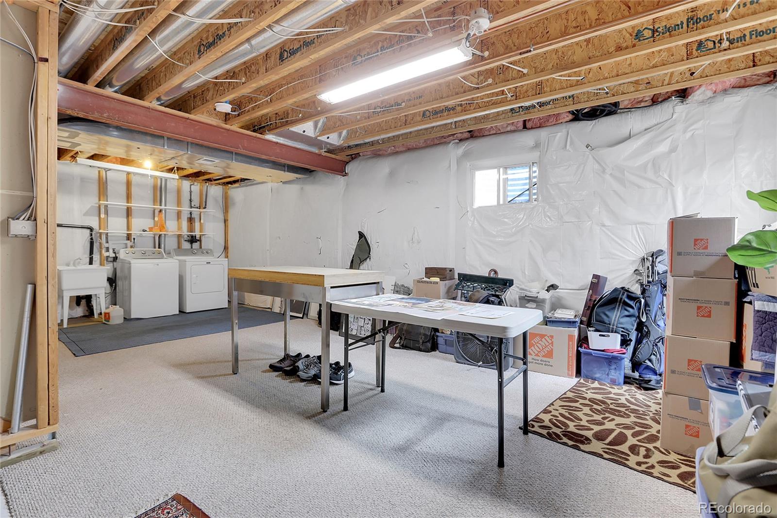 9806 South Castle Ridge Circle Highlands Ranch, CO 80129 - Photo 24 of 36 a view of a workspace with furniture