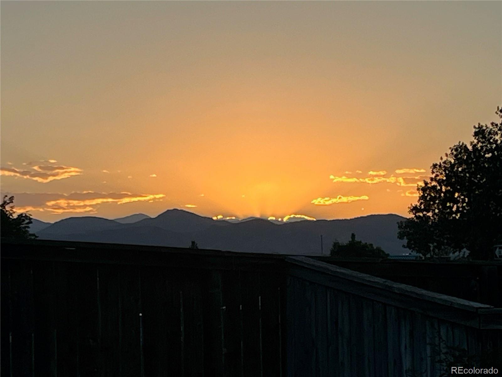 9806 South Castle Ridge Circle Highlands Ranch, CO 80129 - Photo 32 of 36 a view of city and a mountain