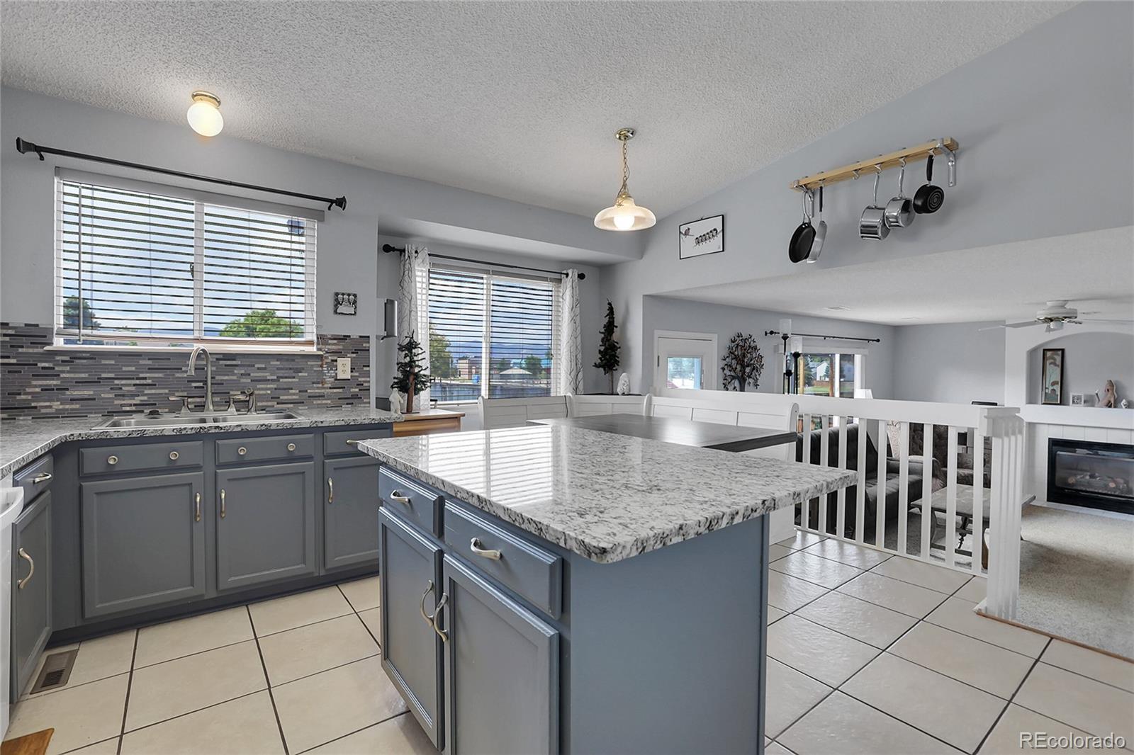 9806 South Castle Ridge Circle Highlands Ranch, CO 80129 - Photo 8 of 36 a kitchen with lots of counter top space