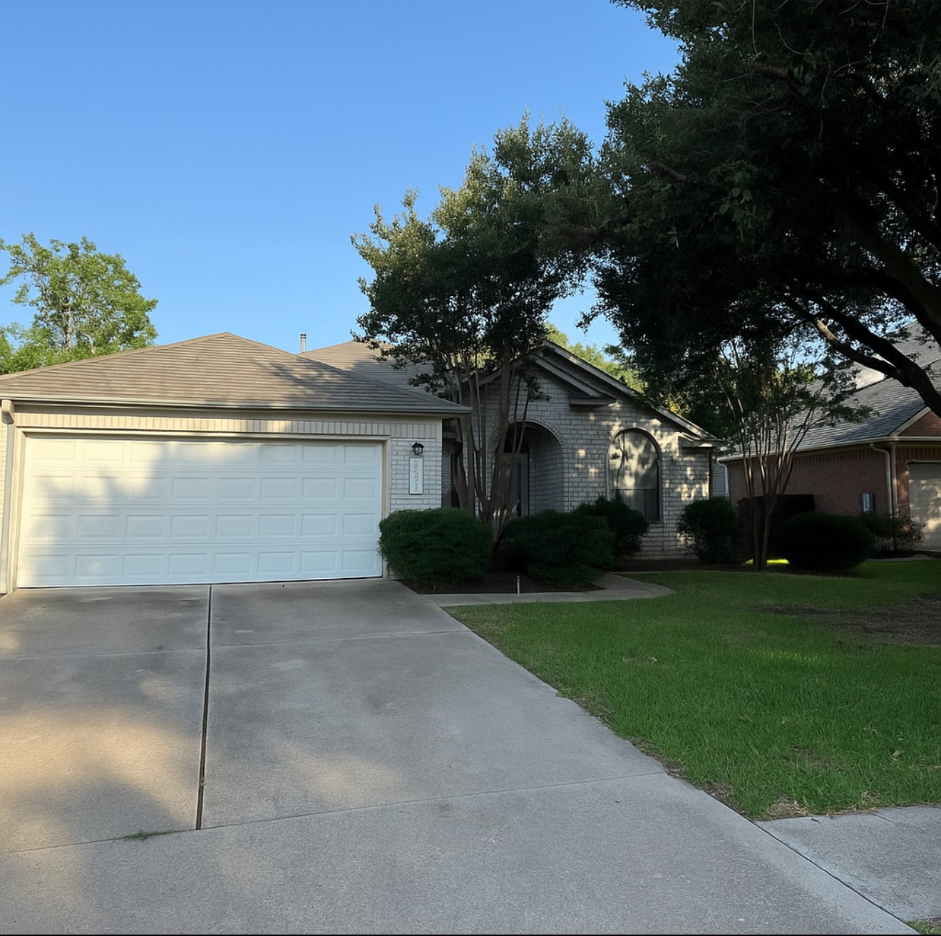 1316 Mesquite Road Cedar Park, TX 78613 - Photo 1 of 24 A well-maintained facade with an arched entry and established landscaping enhances curb appeal.