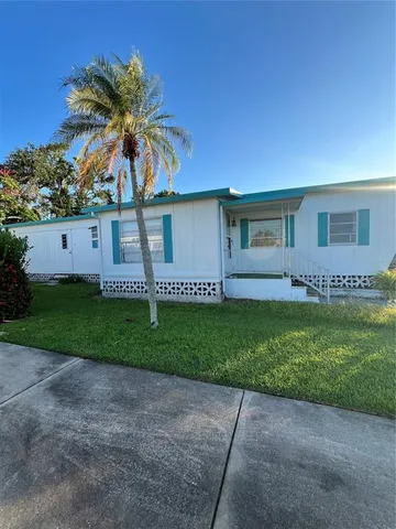 a view of a yard in front of a house