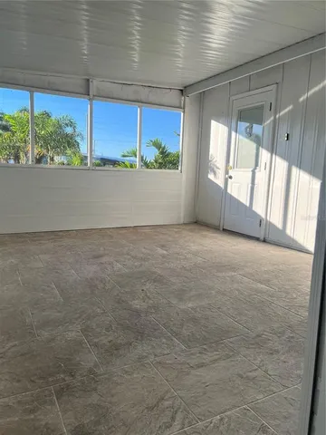 a view of a room with a window