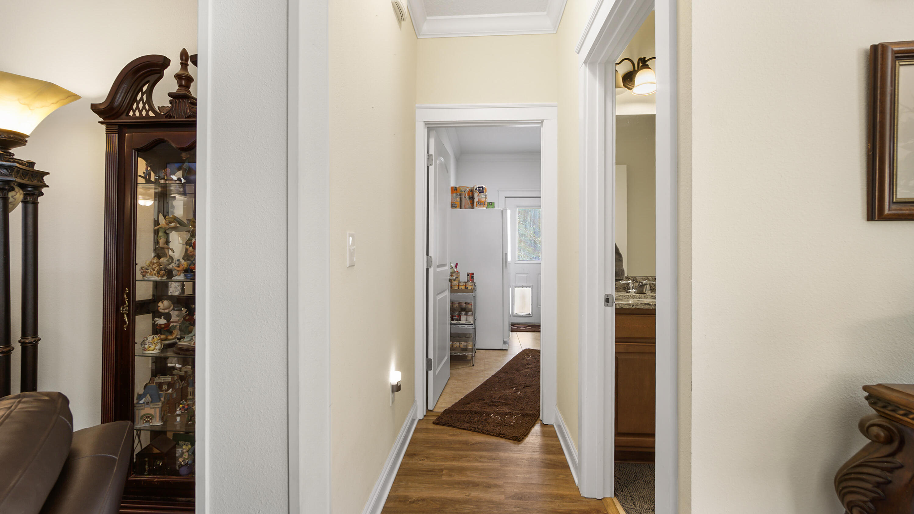1836 Williams Road DeFuniak Springs, FL 32433 - Photo 18 of 41 a view of a hallway with a livingroom and a bathroom