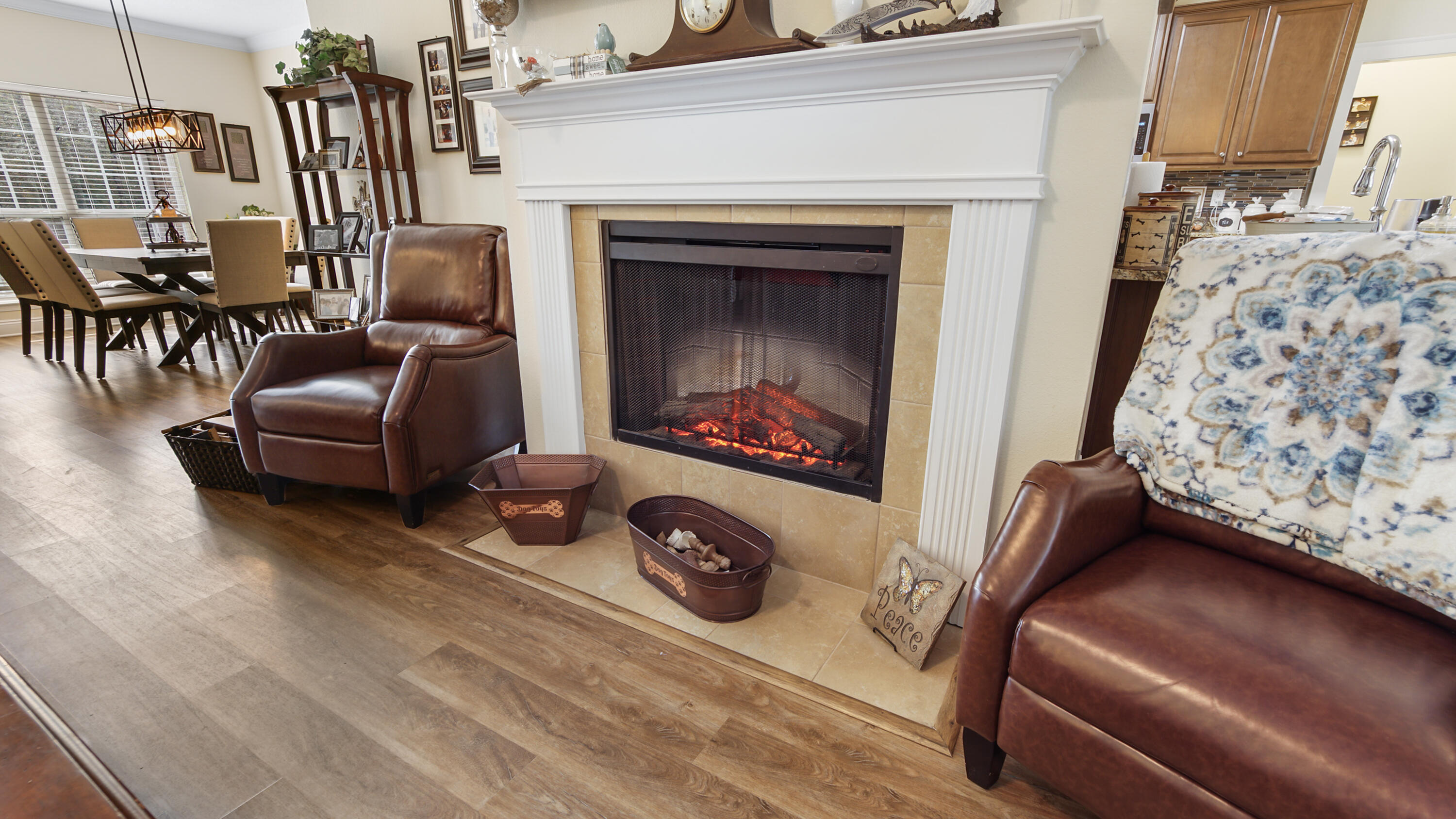 1836 Williams Road DeFuniak Springs, FL 32433 - Photo 23 of 41 a living room with furniture a flat screen tv and a fireplace