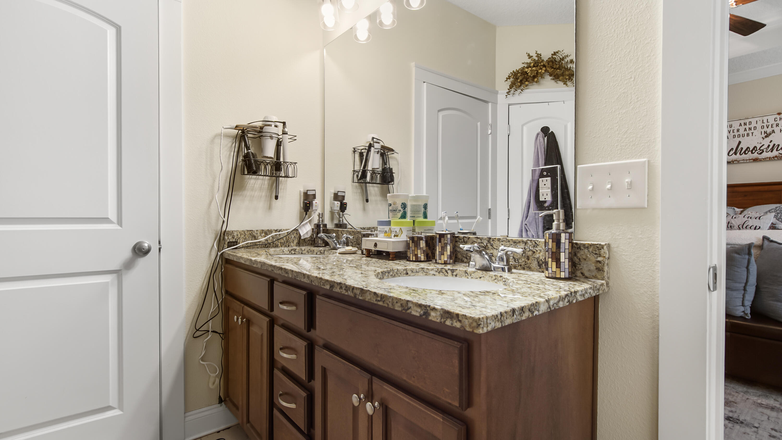 1836 Williams Road DeFuniak Springs, FL 32433 - Photo 30 of 41 a bathroom with a sink and a mirror