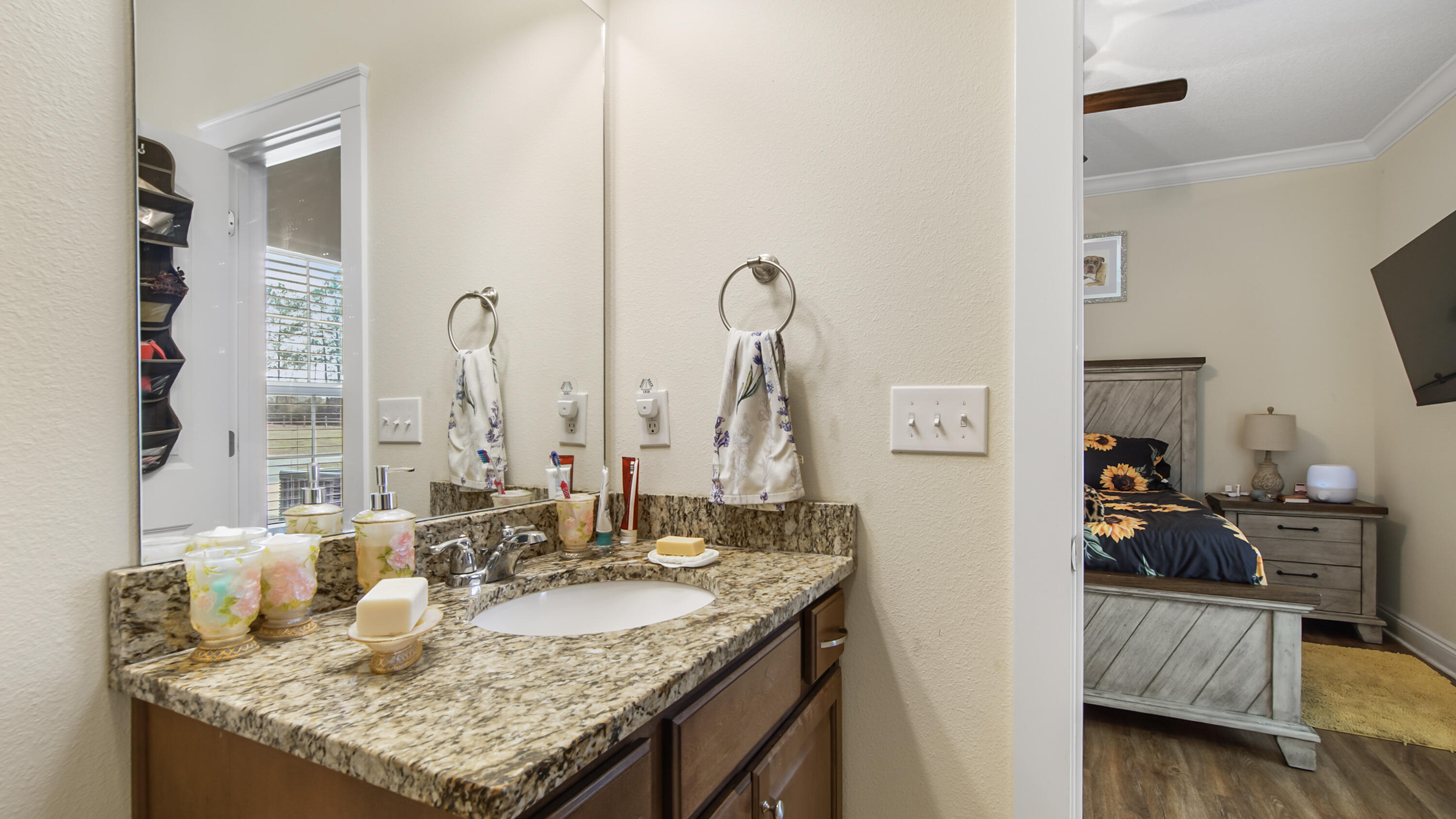 1836 Williams Road DeFuniak Springs, FL 32433 - Photo 38 of 41 a bathroom with sinks granite countertop and a view of living room