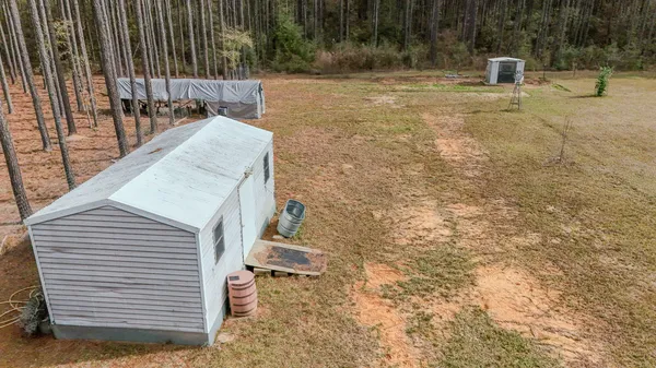 a view of a yard with a chair
