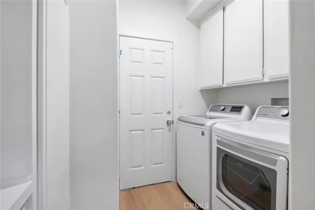 a view of a balcony with lake view and wooden floor