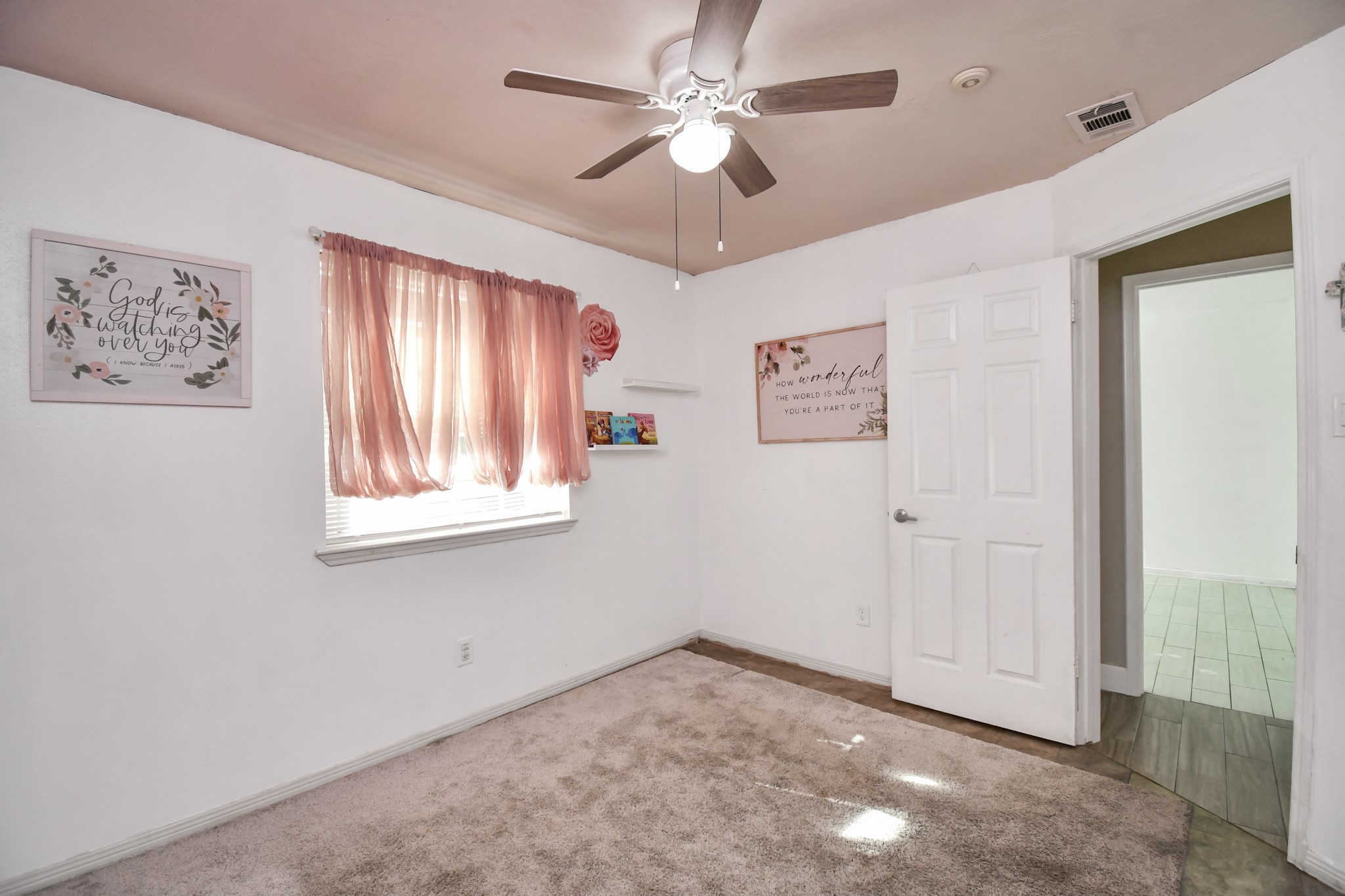 3642 Postwood Drive Spring, TX 77388 - Photo 35 of 43 a view of an empty room with window and cabinet