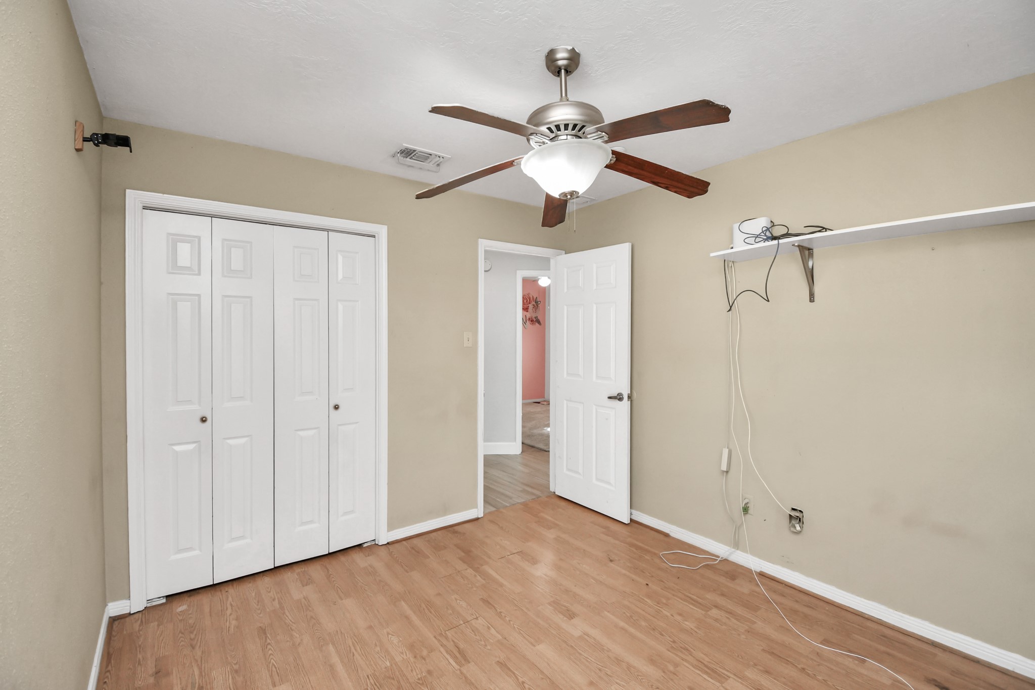 3642 Postwood Drive Spring, TX 77388 - Photo 37 of 43 a view of an empty room and chandelier fan