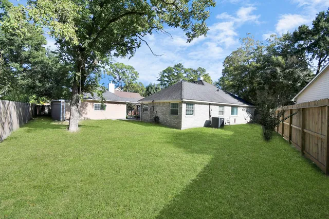 a view of a yard with a house and garden