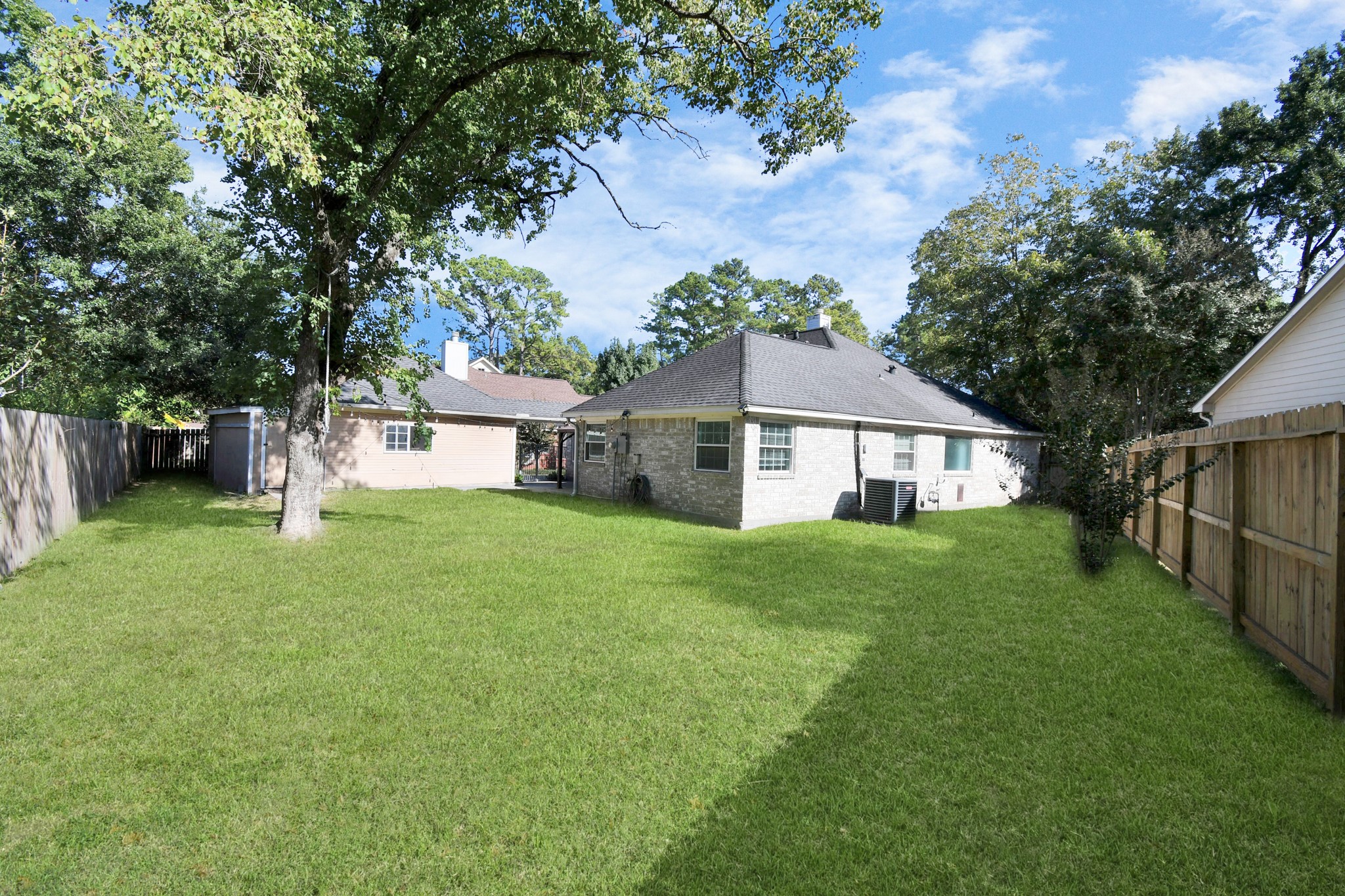3642 Postwood Drive Spring, TX 77388 - Photo 41 of 43 a view of a yard with a house and garden