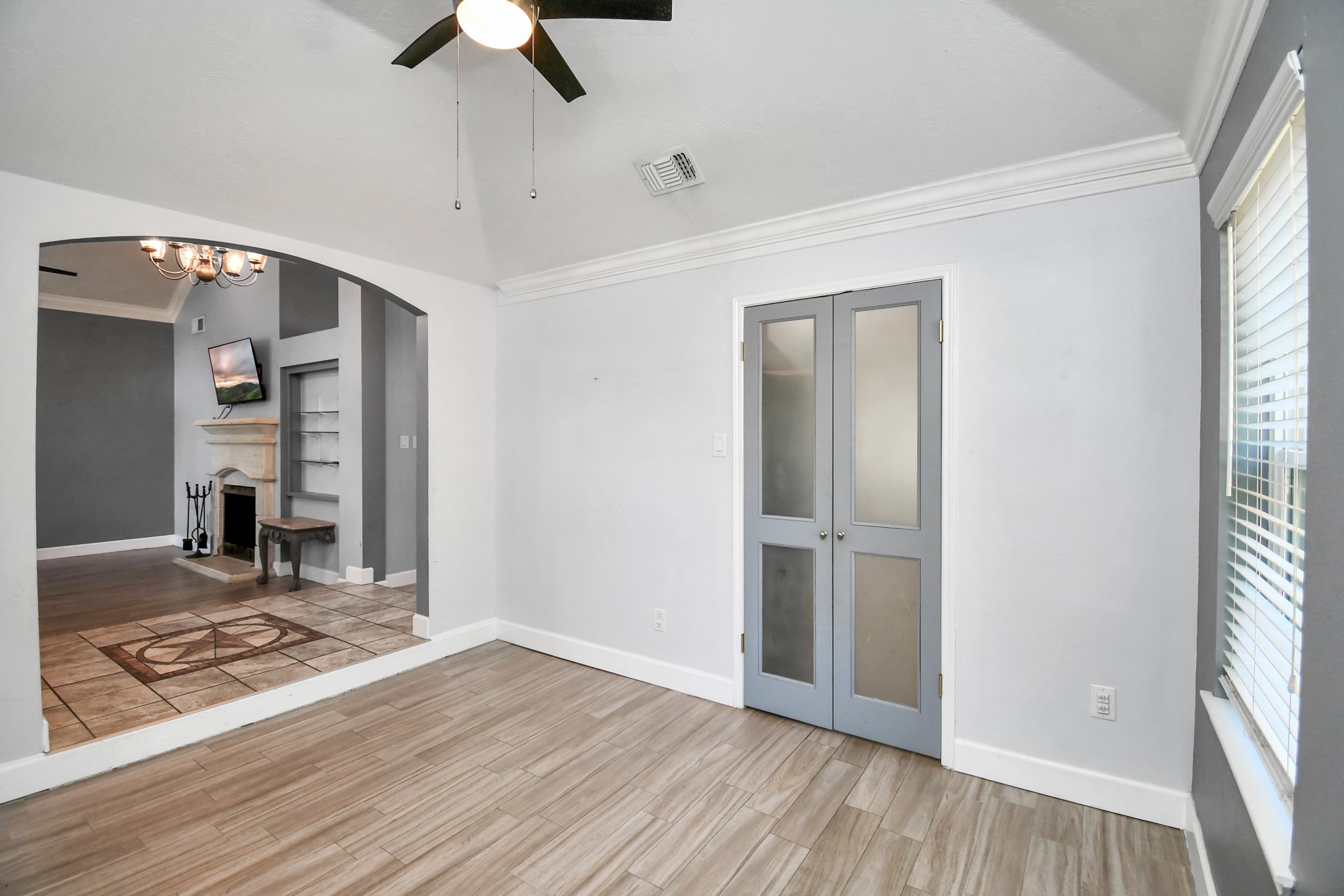 3642 Postwood Drive Spring, TX 77388 - Photo 9 of 43 wooden floor in an empty room with a window