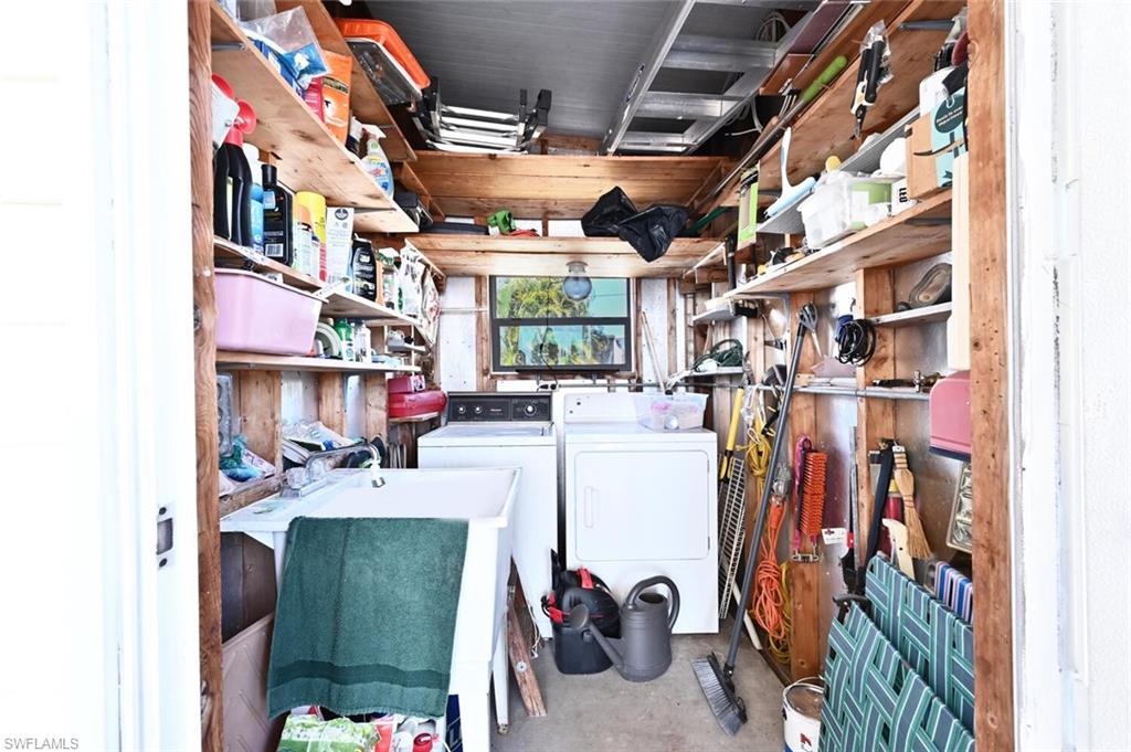 192 Oceans Boulevard, Unit 192 Naples, FL 34104 - Photo 15 of 26 a view of storage and utility room