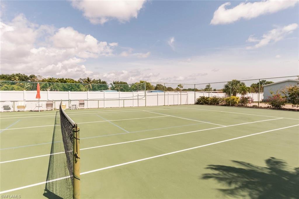 192 Oceans Boulevard, Unit 192 Naples, FL 34104 - Photo 23 of 26 a view of a tennis court