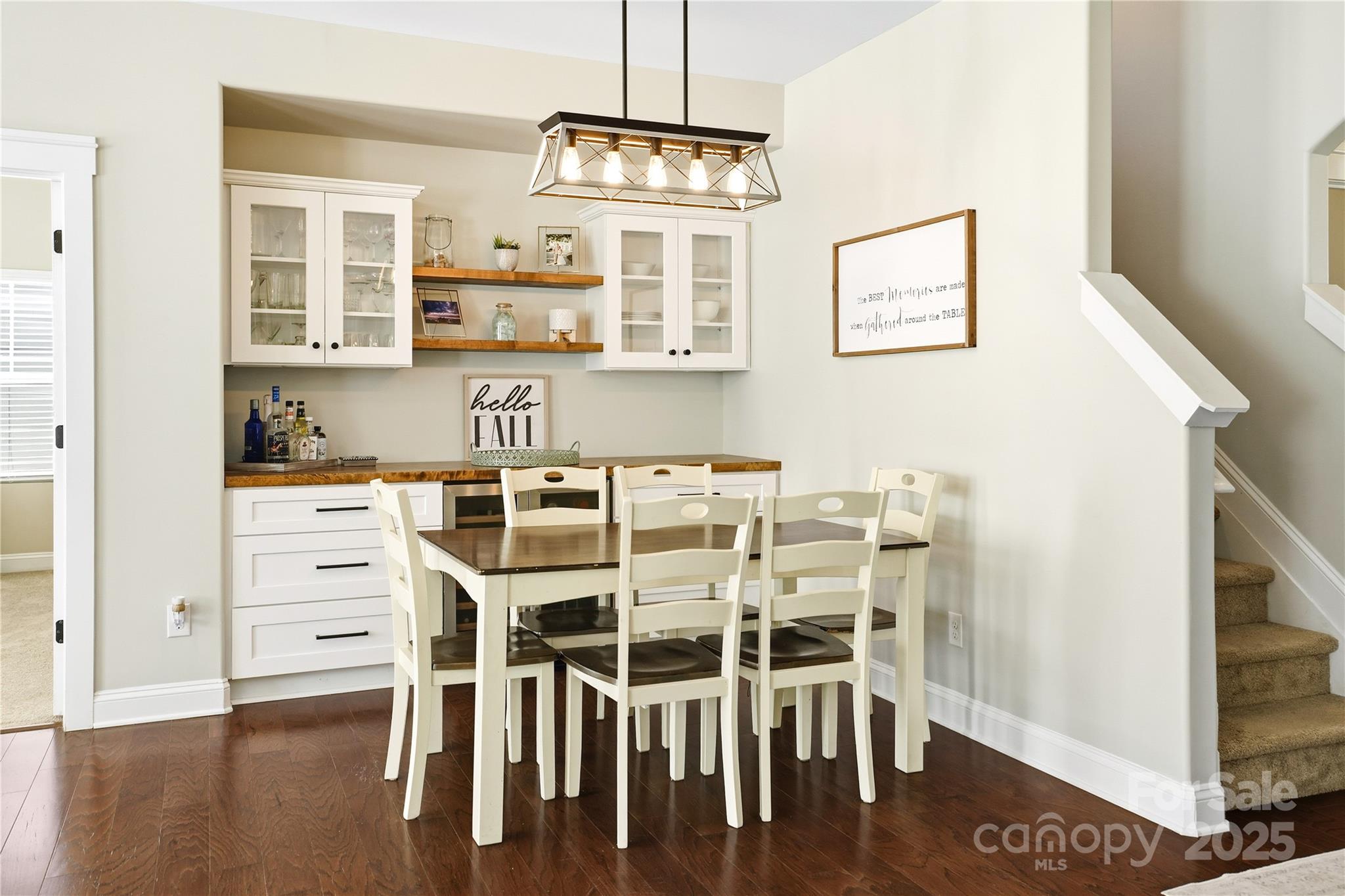3168 Delaware Drive Denver, NC 28037 - Photo 16 of 47 a view of a center island and wooden floor