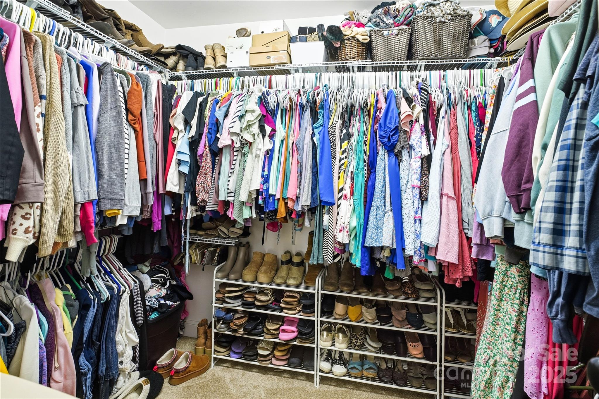 3168 Delaware Drive Denver, NC 28037 - Photo 26 of 47 a view of walk in closet with clothes