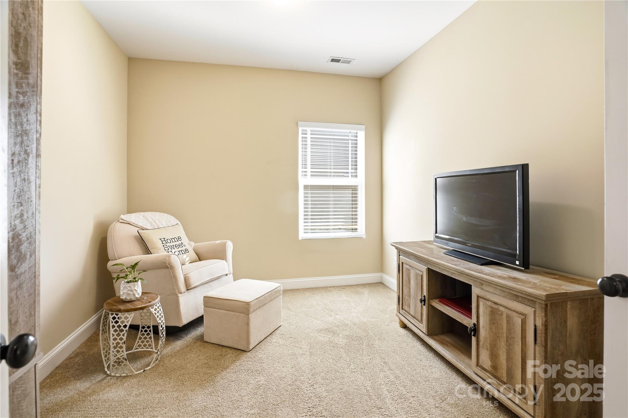 3168 Delaware Drive Denver, NC 28037 - Photo 28 of 47 a living room with furniture and a flat screen tv