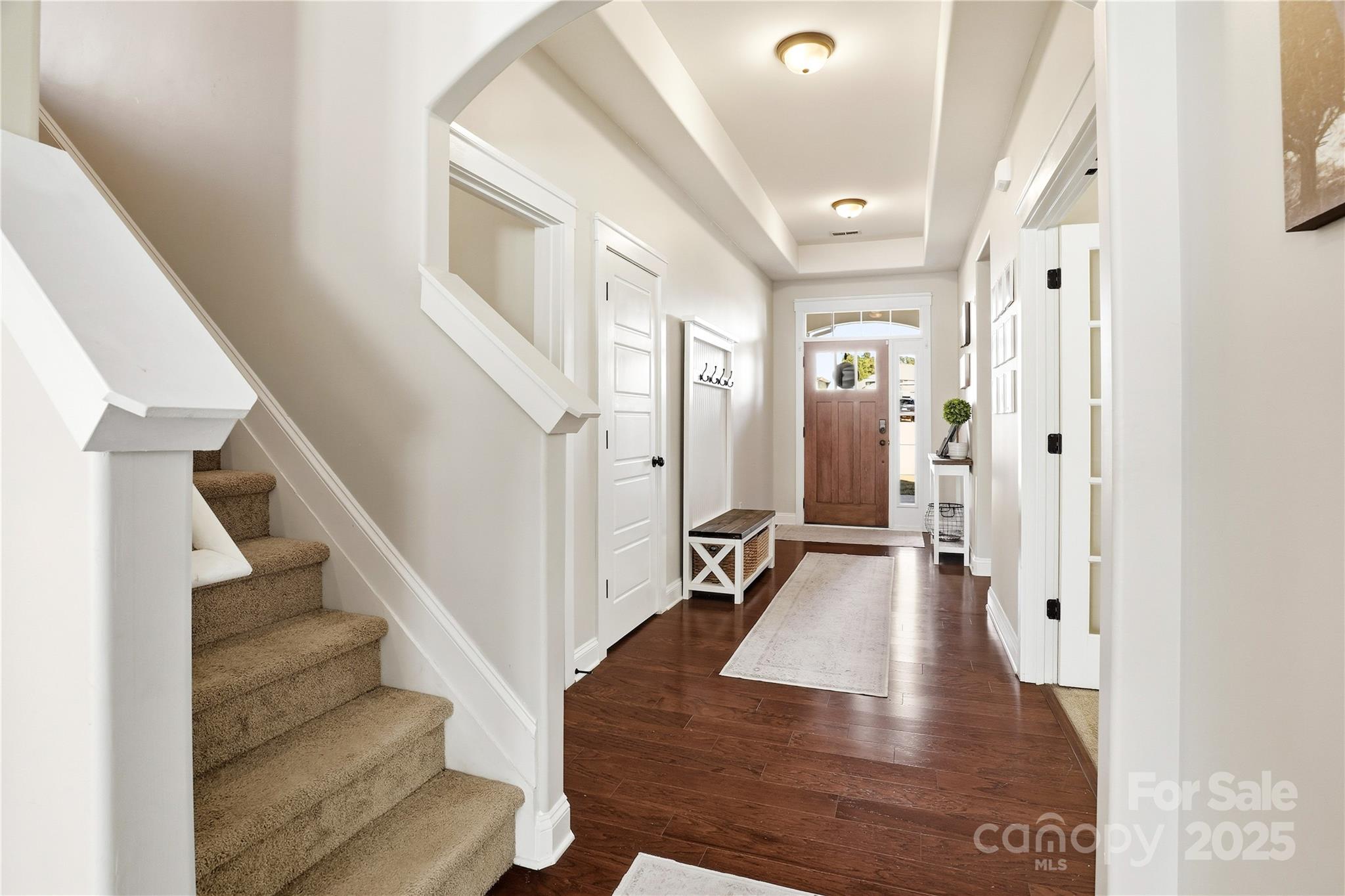 3168 Delaware Drive Denver, NC 28037 - Photo 5 of 47 a view of a hallway view with wooden floor and staircase