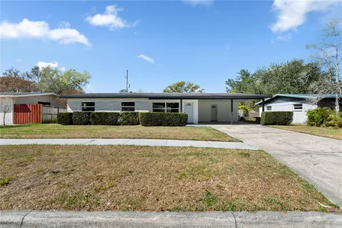 front view of a house with a dry yard