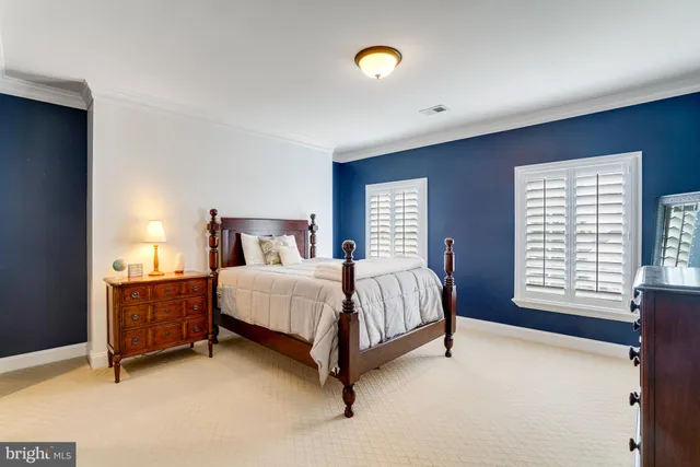 a room with gym equipment and windows