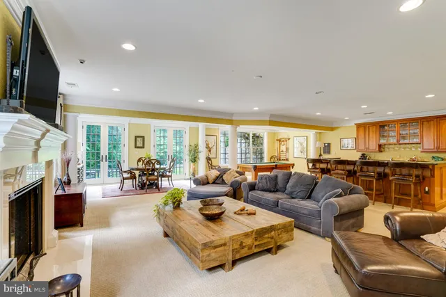 a backyard of a house with lots of green space and trees