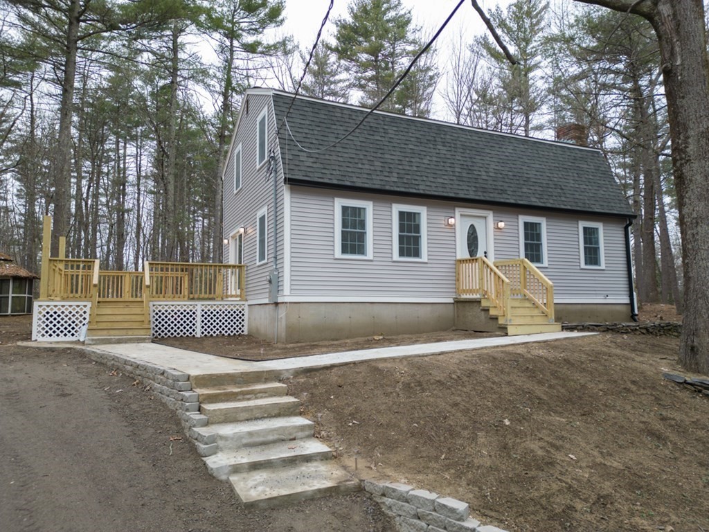 31 Turner Road Townsend, MA 01469 - Photo 1 of 38 a view of a house with backyard and a tree