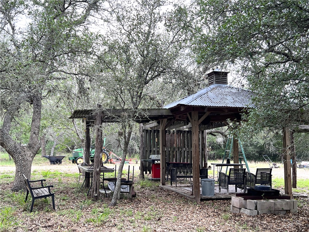 1632 Slickfield Road Yorktown, TX 78164 - Photo 23 of 40 a view of a chairs and tables in patio