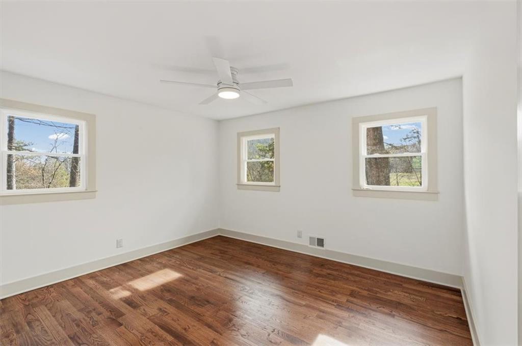 49 Apache Trail Cartersville, GA 30120 - Photo 28 of 52 a view of a room with wooden floor and window