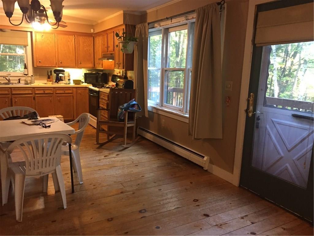 53 Vacationland Road Harrison, ME 04040 - Photo 5 of 22 Kitchen/dining area - door leading...