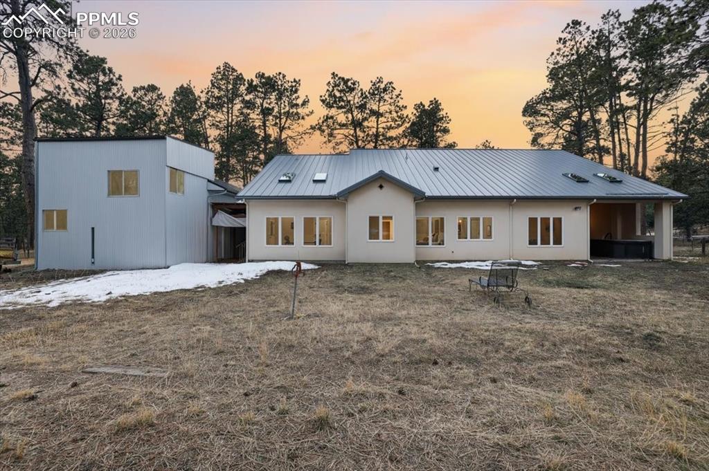 15755 Fool's Gold Lane Colorado Springs, CO 80921 - Photo 49 of 50 a house with trees in the background