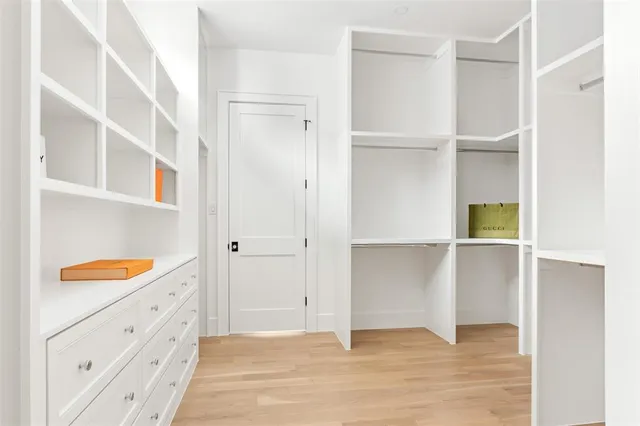 a view of an empty walk in closet