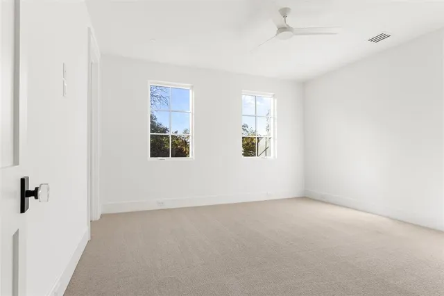 an empty room with windows