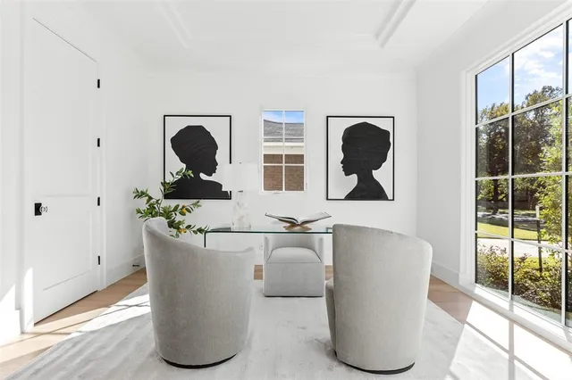 a living room with a couch and a large window