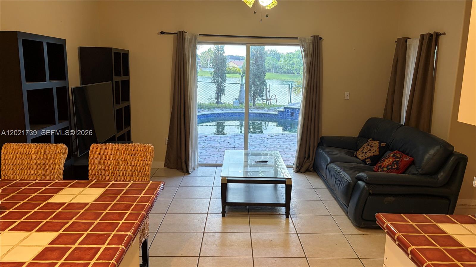 13553 Southwest 124th Avenue Road Miami, FL 33186 - Photo 8 of 31 a living room with furniture